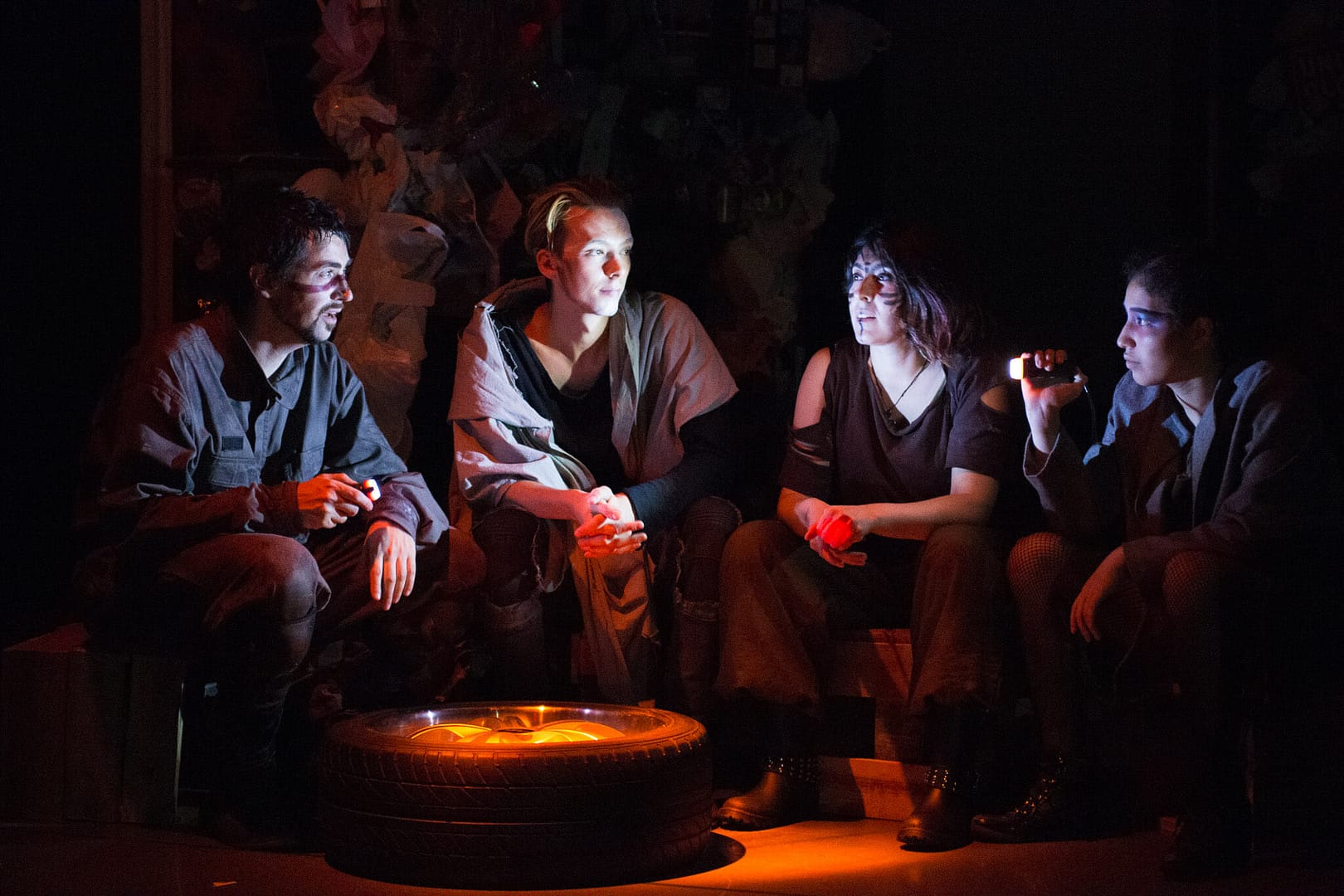 THE OUTLIERS: CAMPFIRE STORIES OF THE FUTURE September 16 - 18, 2017 World Peace Theatre, Kawasaki  Featuring Andrew Woolner, Sasha Aronson, Erik Røger,, and Anisa Dar. Devised by Andrew Woolner, Sasha Aronson, Erik Røger,, and Lindsey Kuhn  Production design by Lindsey Kuhn Sound Design & Music by Chloe Kwok Sound operator and live guitar by Chris Autry  Lights designed by Jeremy Plant Lights operated by Manami Nishida  Stage Crew Paula Tabarez Jiri Terpstra